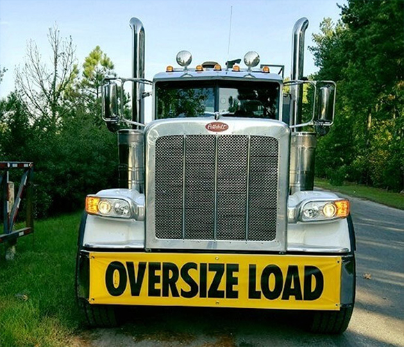 front of oversized load truck